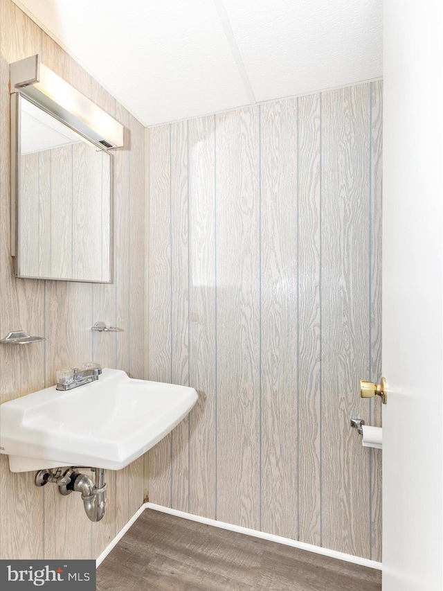 12263 Greenleaf Ave, Potomac, MD 20854 - bathroom with a sink and wood finished floors