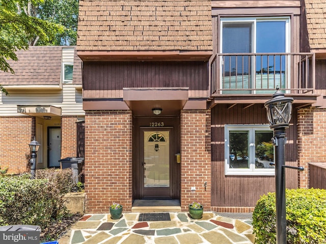 12263 Greenleaf Ave, Potomac, MD 20854 - entrance to property with a balcony and brick siding