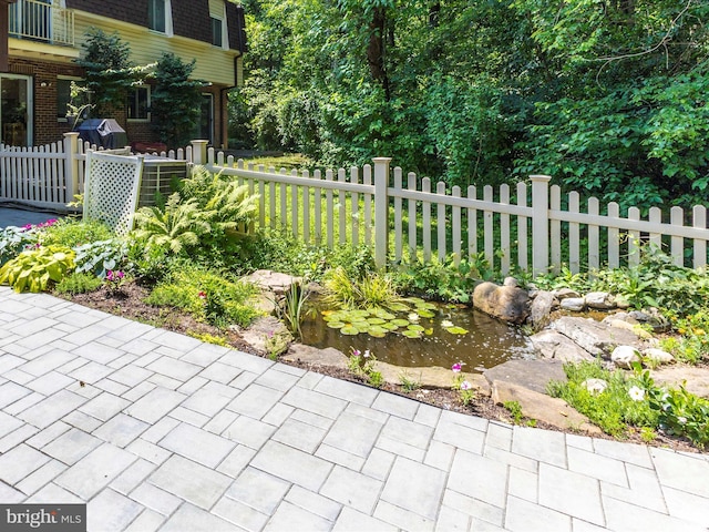 12263 Greenleaf Ave, Potomac, MD 20854 - view of patio with a garden pond