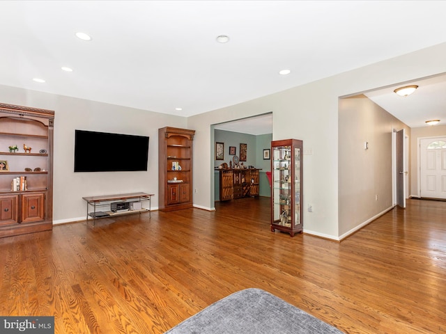 12263 Greenleaf Ave, Potomac, MD 20854 - living area with wood finished floors and recessed lighting