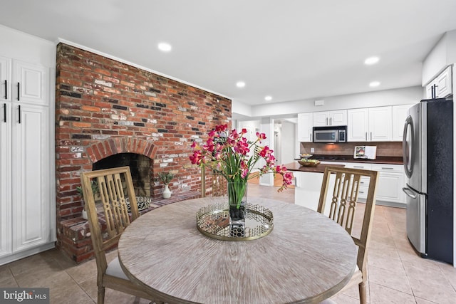 906 Danton Ln, Alexandria, VA 22308 - dining space with light tile patterned flooring and recessed lighting