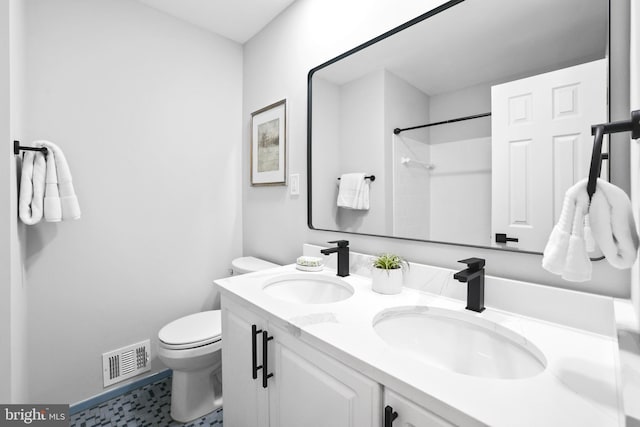906 Danton Ln, Alexandria, VA 22308 - full bathroom featuring double vanity and a shower