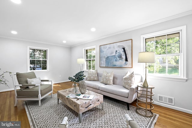 906 Danton Ln, Alexandria, VA 22308 - living room featuring ornamental molding, wood finished floors, and recessed lighting