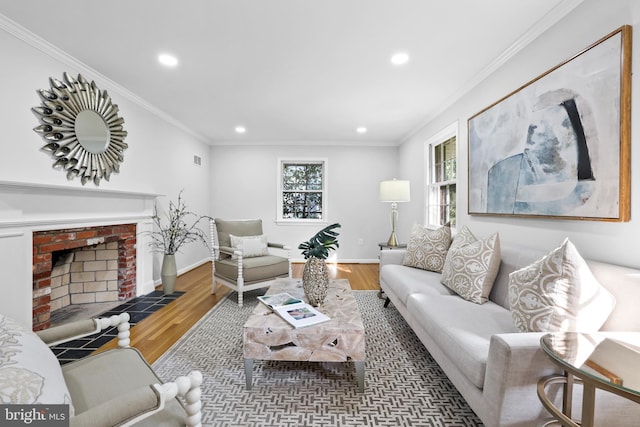 906 Danton Ln, Alexandria, VA 22308 - living room featuring recessed lighting, wood finished floors, a fireplace, and ornamental molding