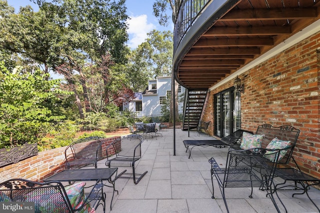 906 Danton Ln, Alexandria, VA 22308 - view of patio / terrace featuring stairs and outdoor dining area