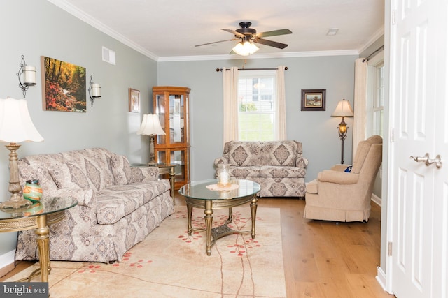 1338 Chami Dr Unit 196, Spring Grove, PA 17362 - living area with ceiling fan, crown molding, and light wood-style floors