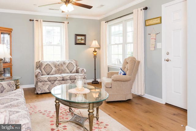 1338 Chami Dr Unit 196, Spring Grove, PA 17362 - living area featuring a ceiling fan, light wood-type flooring, and ornamental molding