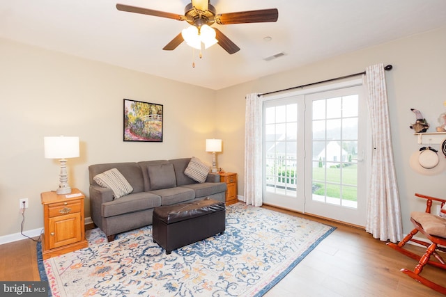 1338 Chami Dr Unit 196, Spring Grove, PA 17362 - living room with healthy amount of natural light, wood finished floors, and a ceiling fan