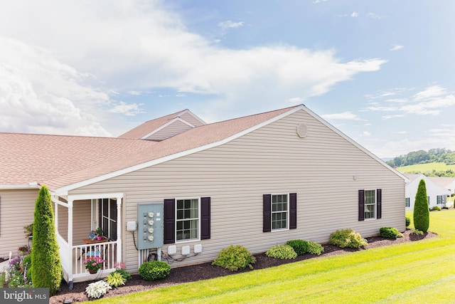 1338 Chami Dr Unit 196, Spring Grove, PA 17362 - view of front of house featuring a front lawn and roof with shingles