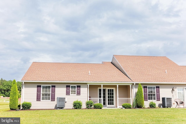 1338 Chami Dr Unit 196, Spring Grove, PA 17362 - rear view of property featuring a lawn and a shingled roof