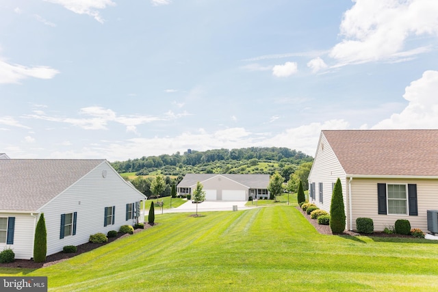 1338 Chami Dr Unit 196, Spring Grove, PA 17362 - view of green lawn featuring a garage