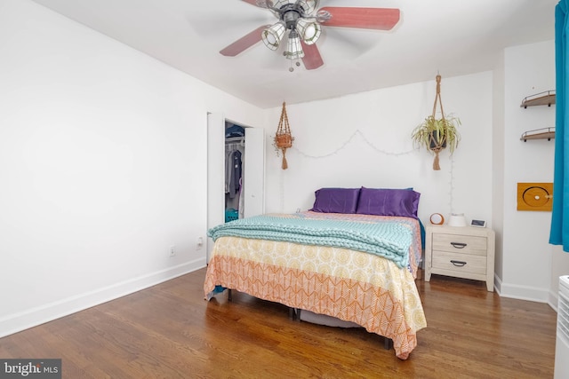 2302 Searles Rd, Dundalk, MD 21222 - bedroom with wood finished floors, a closet, and a ceiling fan