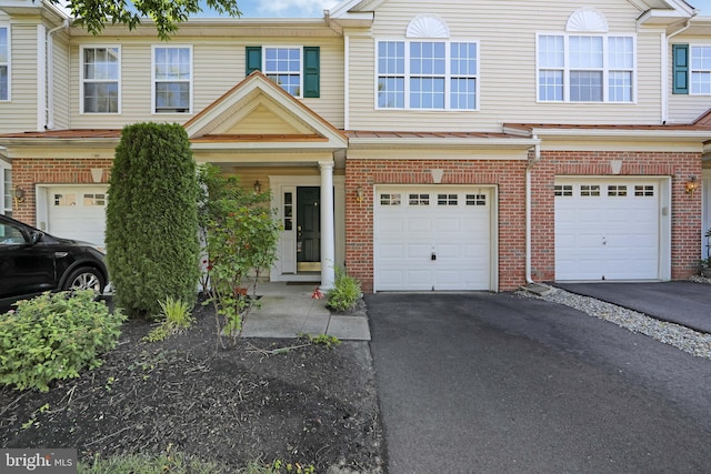 304 Amy Way, Cinnaminson, NJ 08077 - multi unit property featuring an attached garage, brick siding, and driveway