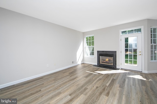 304 Amy Way, Cinnaminson, NJ 08077 - unfurnished living room featuring wood finished floors and a fireplace with flush hearth