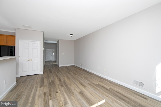 304 Amy Way, Cinnaminson, NJ 08077 - unfurnished living room featuring light wood finished floors and baseboards
