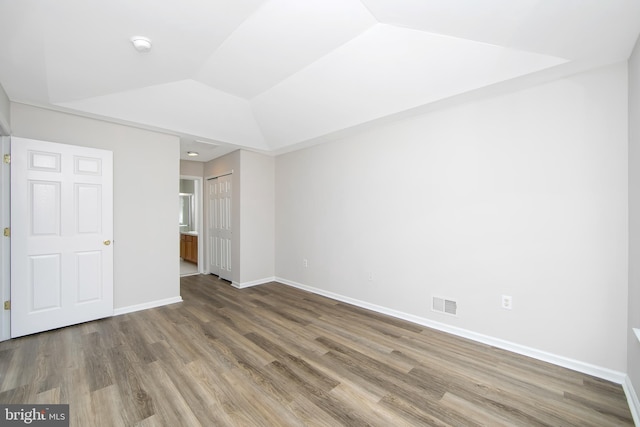 304 Amy Way, Cinnaminson, NJ 08077 - unfurnished bedroom featuring wood finished floors, lofted ceiling, and ensuite bathroom