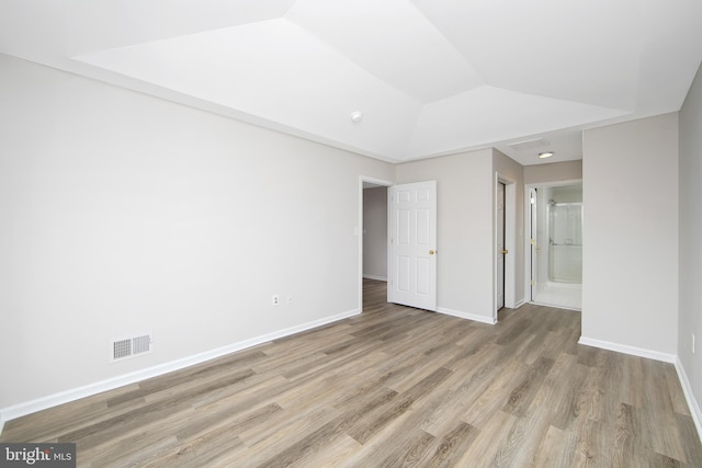 304 Amy Way, Cinnaminson, NJ 08077 - unfurnished bedroom with wood finished floors, ensuite bathroom, and vaulted ceiling