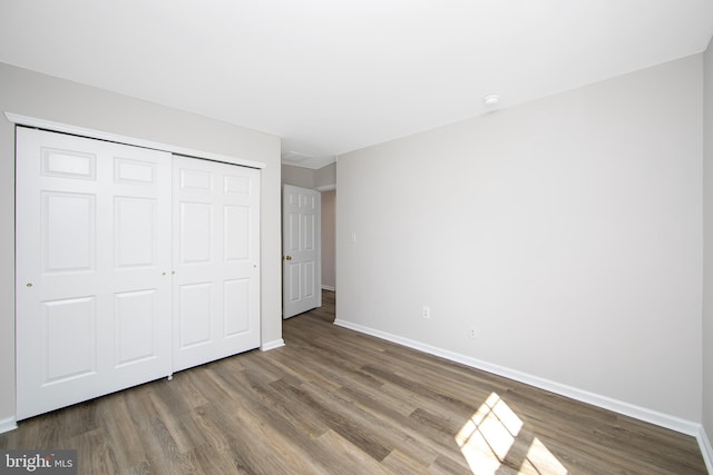 304 Amy Way, Cinnaminson, NJ 08077 - unfurnished bedroom with wood finished floors and a closet