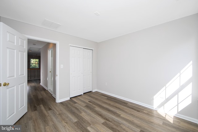 304 Amy Way, Cinnaminson, NJ 08077 - unfurnished bedroom with dark wood-style floors and a closet