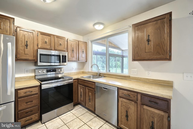 4604 View Dr, Spring Grove, PA 17362 - kitchen featuring appliances with stainless steel finishes, light countertops, and light tile patterned floors