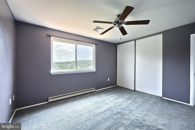 4604 View Dr, Spring Grove, PA 17362 - unfurnished bedroom featuring a baseboard heating unit, carpet, a closet, and a ceiling fan