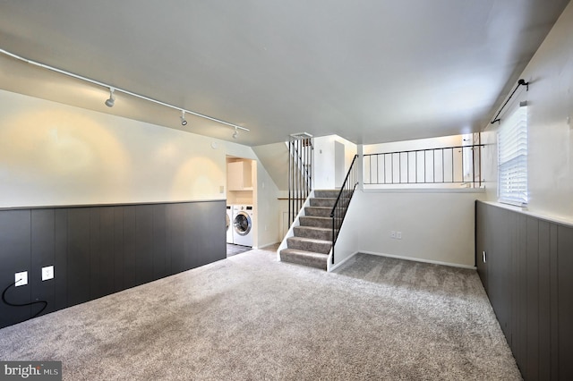 4604 View Dr, Spring Grove, PA 17362 - spare room featuring rail lighting, carpet floors, washer and clothes dryer, wainscoting, and wood walls