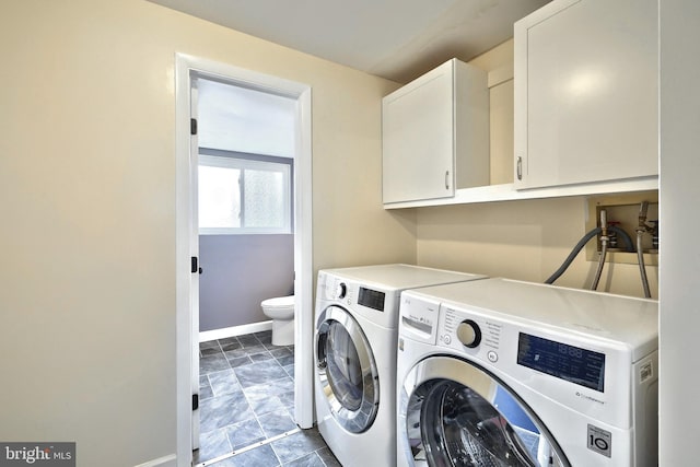 4604 View Dr, Spring Grove, PA 17362 - laundry room featuring cabinet space, separate washer and dryer, and stone finish flooring