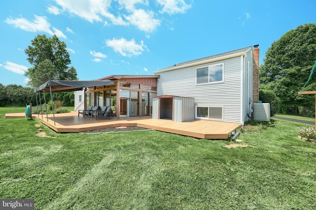 4604 View Dr, Spring Grove, PA 17362 - back of house featuring a chimney, a deck, and a yard