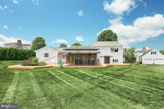 4604 View Dr, Spring Grove, PA 17362 - back of property featuring a sunroom, a wooden deck, and a lawn