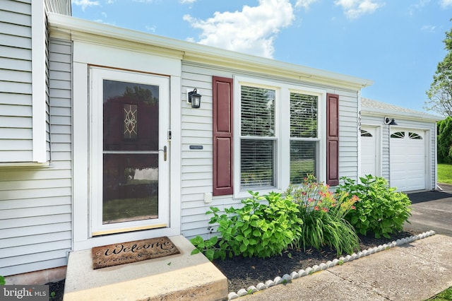 4604 View Dr, Spring Grove, PA 17362 - doorway to property featuring asphalt driveway and an attached garage