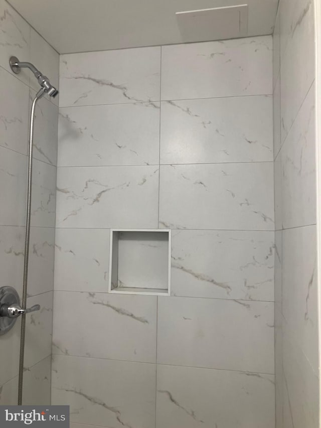 18327 Ivy Oak Ter, Gaithersburg, MD 20877 - full bathroom with a tile shower