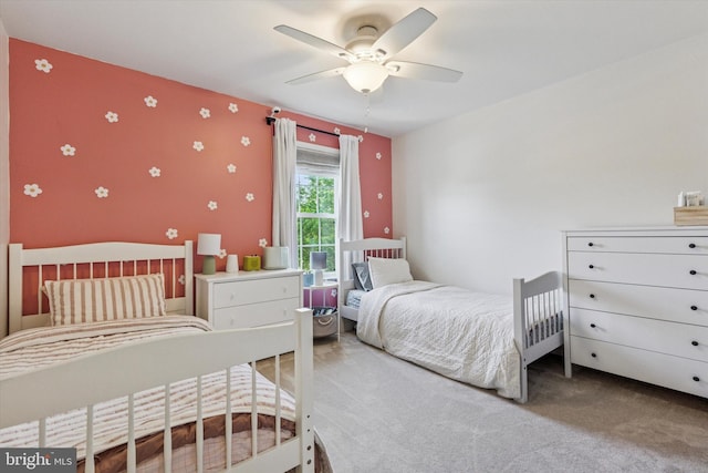 100 Windsor Ct, Richlandtown, PA 18955 - bedroom with carpet flooring, wallpapered walls, an accent wall, and a ceiling fan
