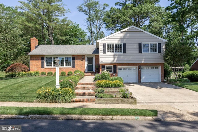 295 Crescent Ave, Moorestown, NJ 08057 - split level home featuring brick siding, a garage, driveway, and a front yard
