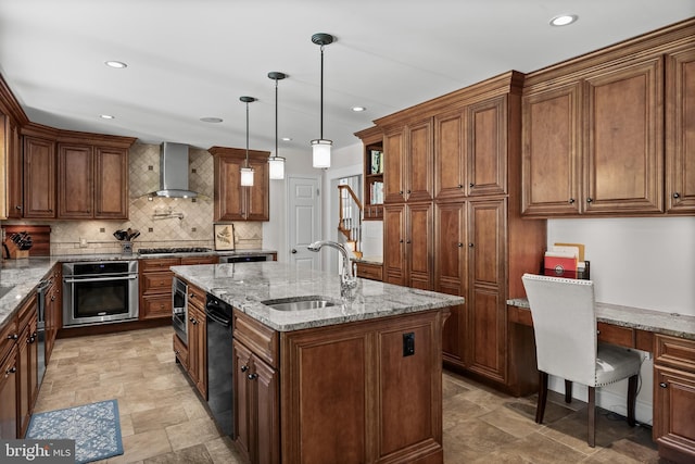 295 Crescent Ave, Moorestown, NJ 08057 - kitchen with stainless steel appliances, wall chimney exhaust hood, an island with sink, decorative backsplash, and light stone counters