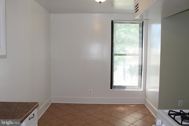 130 Duvall Ln Unit 194-202, Gaithersburg, MD 20877 - unfurnished dining area featuring light tile patterned flooring and plenty of natural light