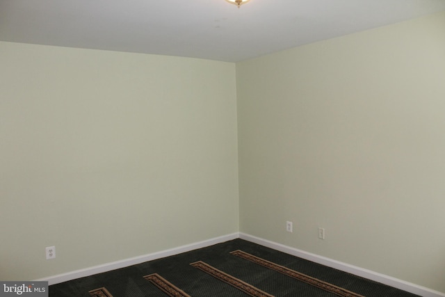 130 Duvall Ln Unit 194-202, Gaithersburg, MD 20877 - unfurnished room featuring baseboards and dark colored carpet