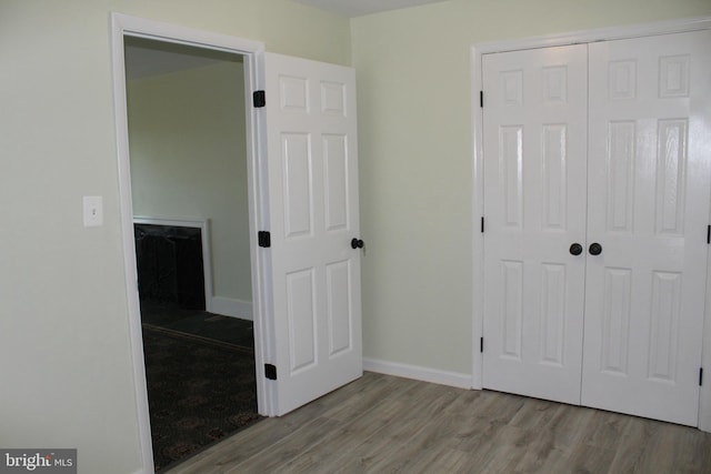 130 Duvall Ln Unit 194-202, Gaithersburg, MD 20877 - unfurnished bedroom featuring wood finished floors and a closet