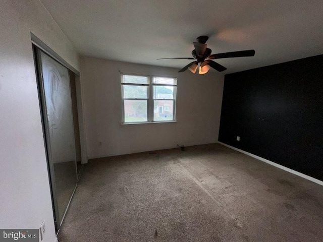 7638 Thouron Ave, Philadelphia, PA 19150 - unfurnished bedroom with carpet floors, a closet, and a ceiling fan
