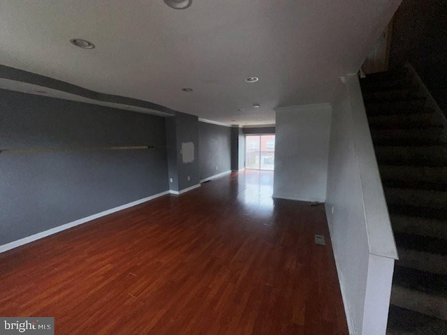 7638 Thouron Ave, Philadelphia, PA 19150 - unfurnished living room with wood finished floors, stairway, and recessed lighting