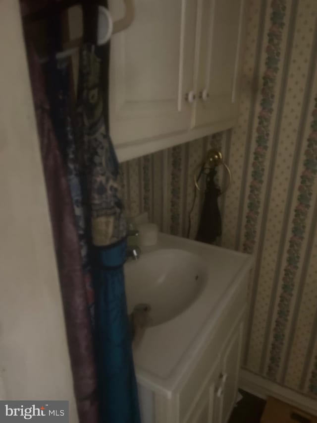 19 E Main St, Richland, PA 17087 - bathroom featuring wallpapered walls and vanity