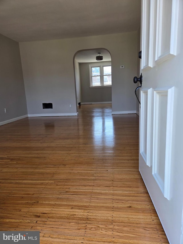 814 4th Ave, Bristol, PA 19007 - unfurnished room with arched walkways and wood finished floors
