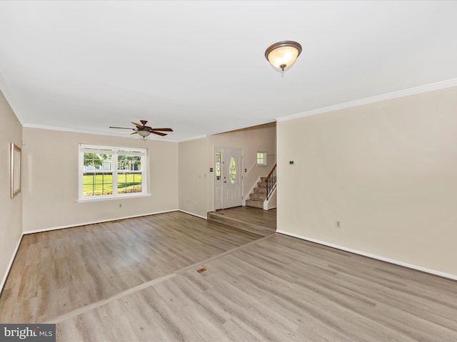 23732 Rolling Fork Way, Gaithersburg, MD 20882 - unfurnished living room with crown molding, stairs, a ceiling fan, and wood finished floors
