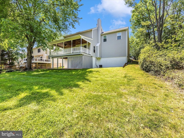 23732 Rolling Fork Way, Gaithersburg, MD 20882 - rear view of house featuring a lawn, a chimney, and a wooden deck