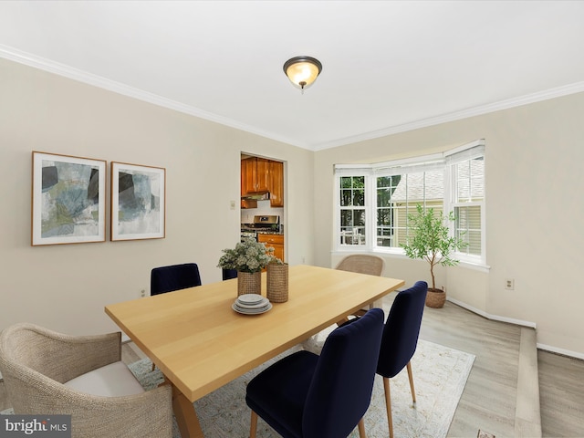23732 Rolling Fork Way, Gaithersburg, MD 20882 - dining space featuring ornamental molding and light wood-style floors