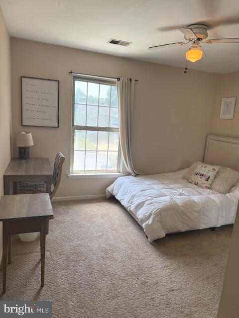 325 Newton Ct, Haddon Township, NJ 08107 - carpeted bedroom with baseboards and a ceiling fan