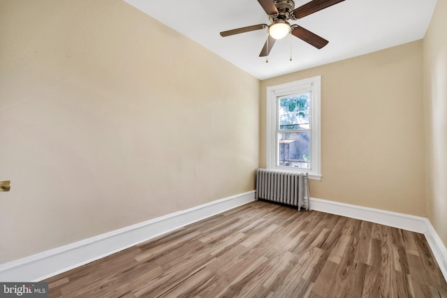 100 Powelton Ave, Lansdowne, PA 19050 - spare room with radiator, wood finished floors, and ceiling fan