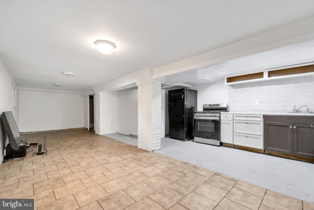 100 Powelton Ave, Lansdowne, PA 19050 - kitchen featuring stainless steel gas range, backsplash, light countertops, and open shelves