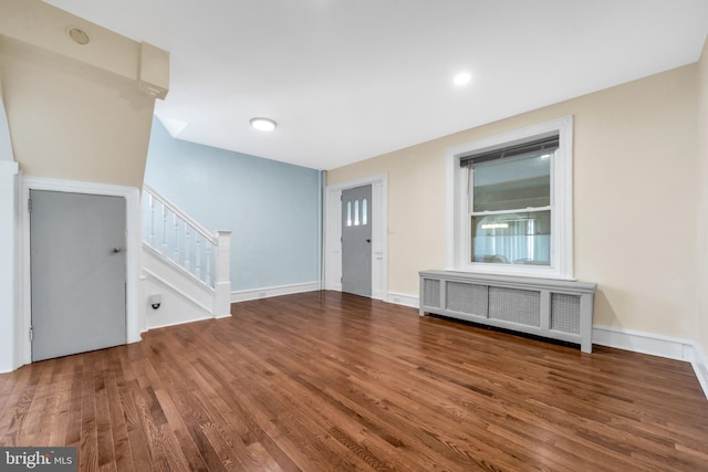 100 Powelton Ave, Lansdowne, PA 19050 - entryway with radiator heating unit, wood finished floors, and stairs