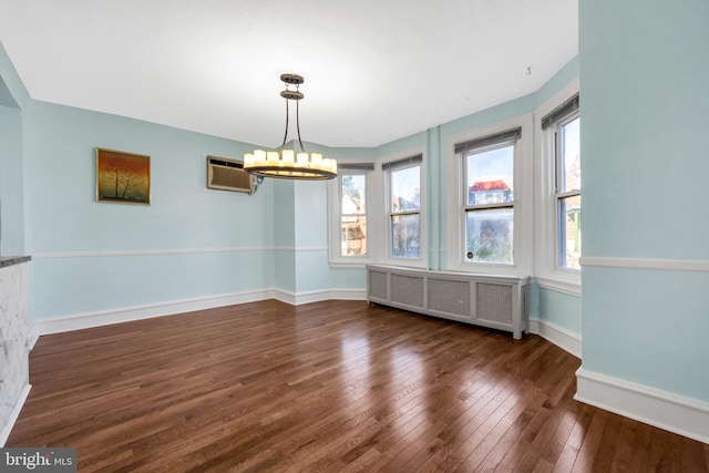100 Powelton Ave, Lansdowne, PA 19050 - unfurnished dining area with radiator heating unit, a chandelier, hardwood / wood-style floors, and a wall mounted AC