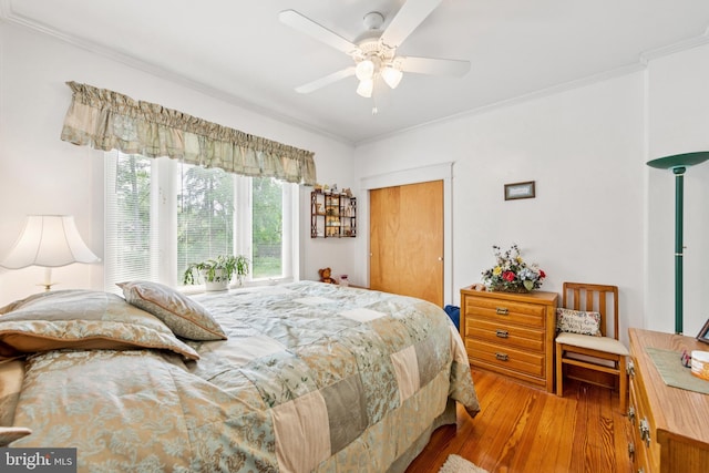 615 Convent Rd, Aston, PA 19014 - bedroom with hardwood / wood-style floors, ornamental molding, a closet, and a ceiling fan